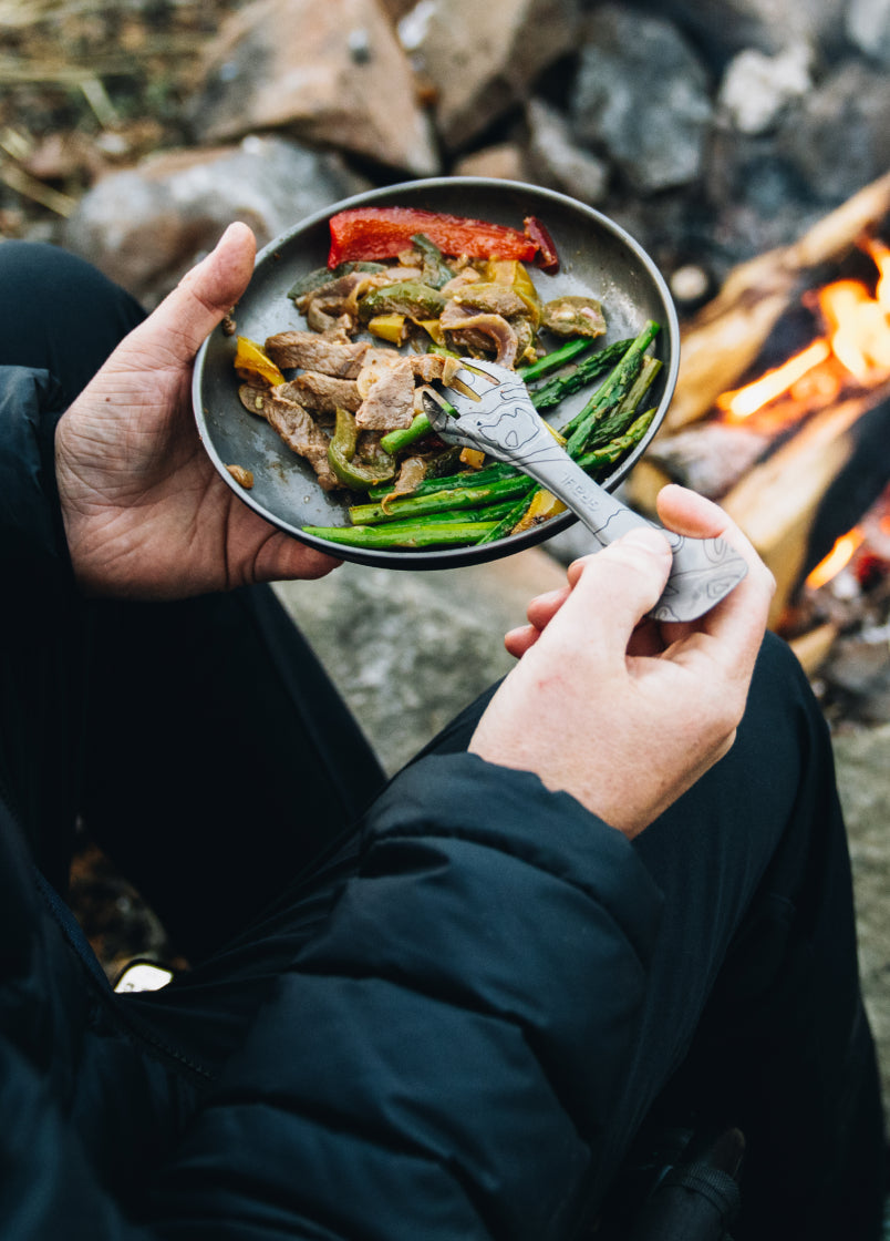 Grayl® Titanium Plate with a hot camp meal.