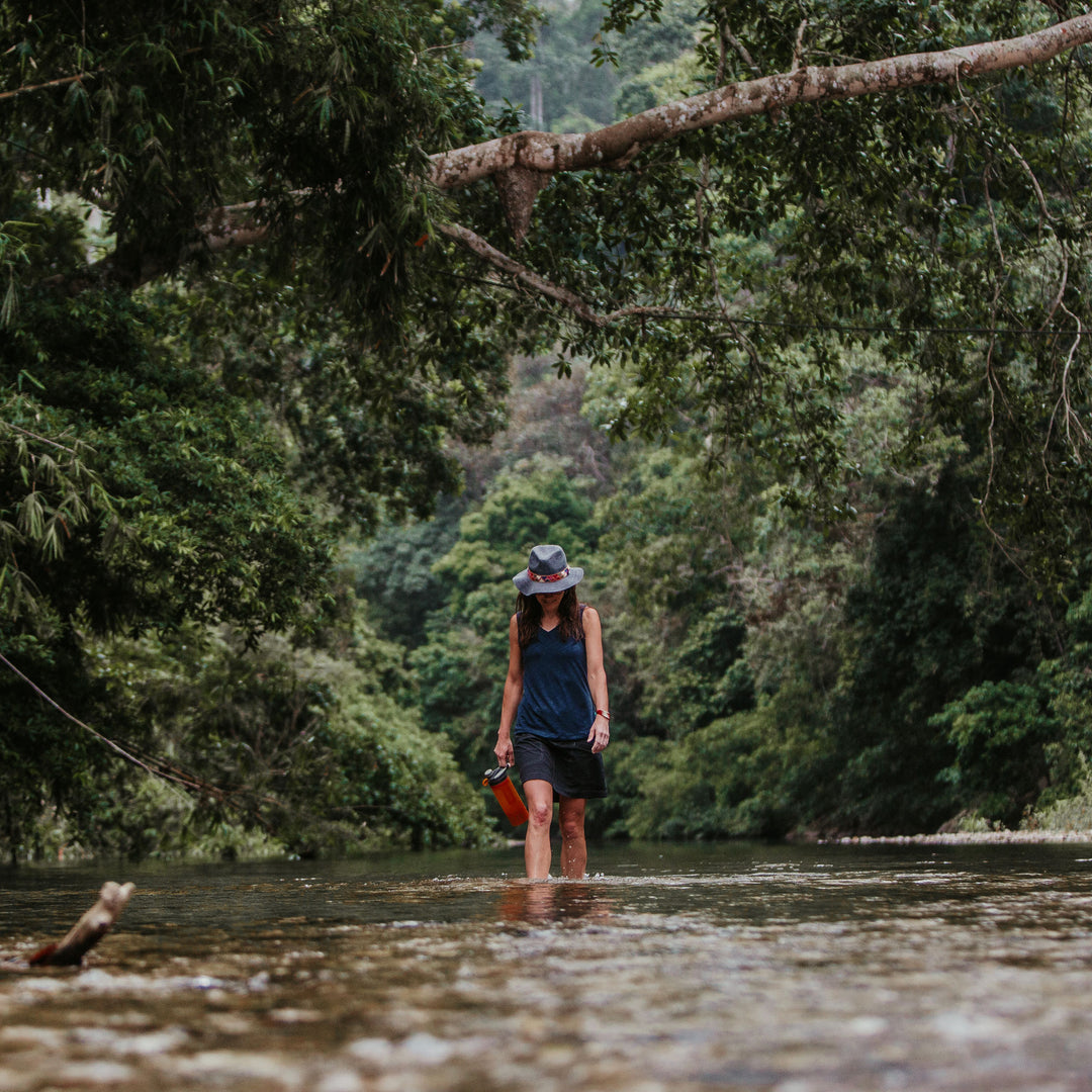 Martha Rolfson filtering and purifying water with her Grayl GeoPress in Colombia. 