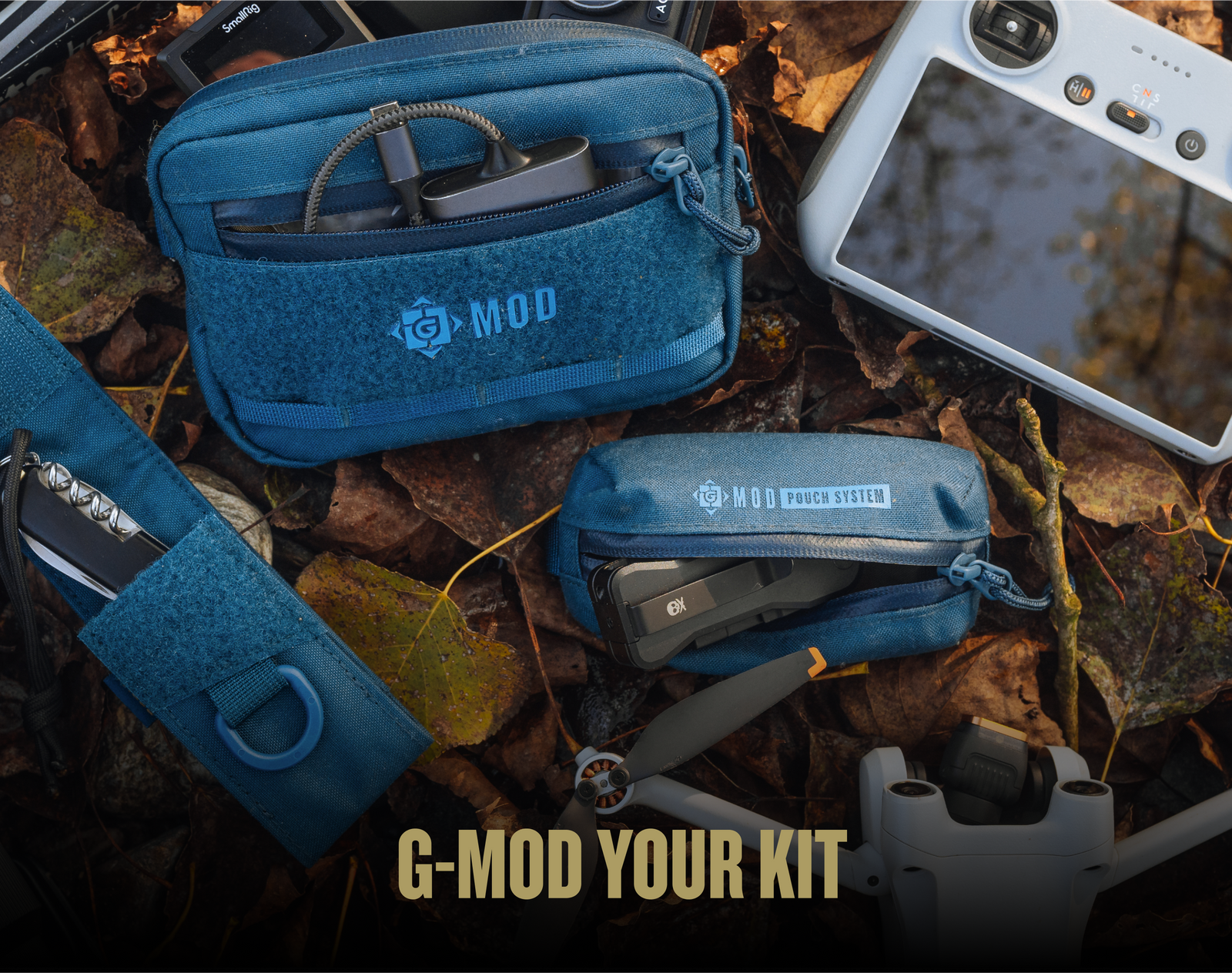 G-MOD Accessory Pouches pictured on forest ground next to a drone. Flat wallet pouch, Multi-tool pouch, and AirPod pouch picture along with assorted everyday carry tools.