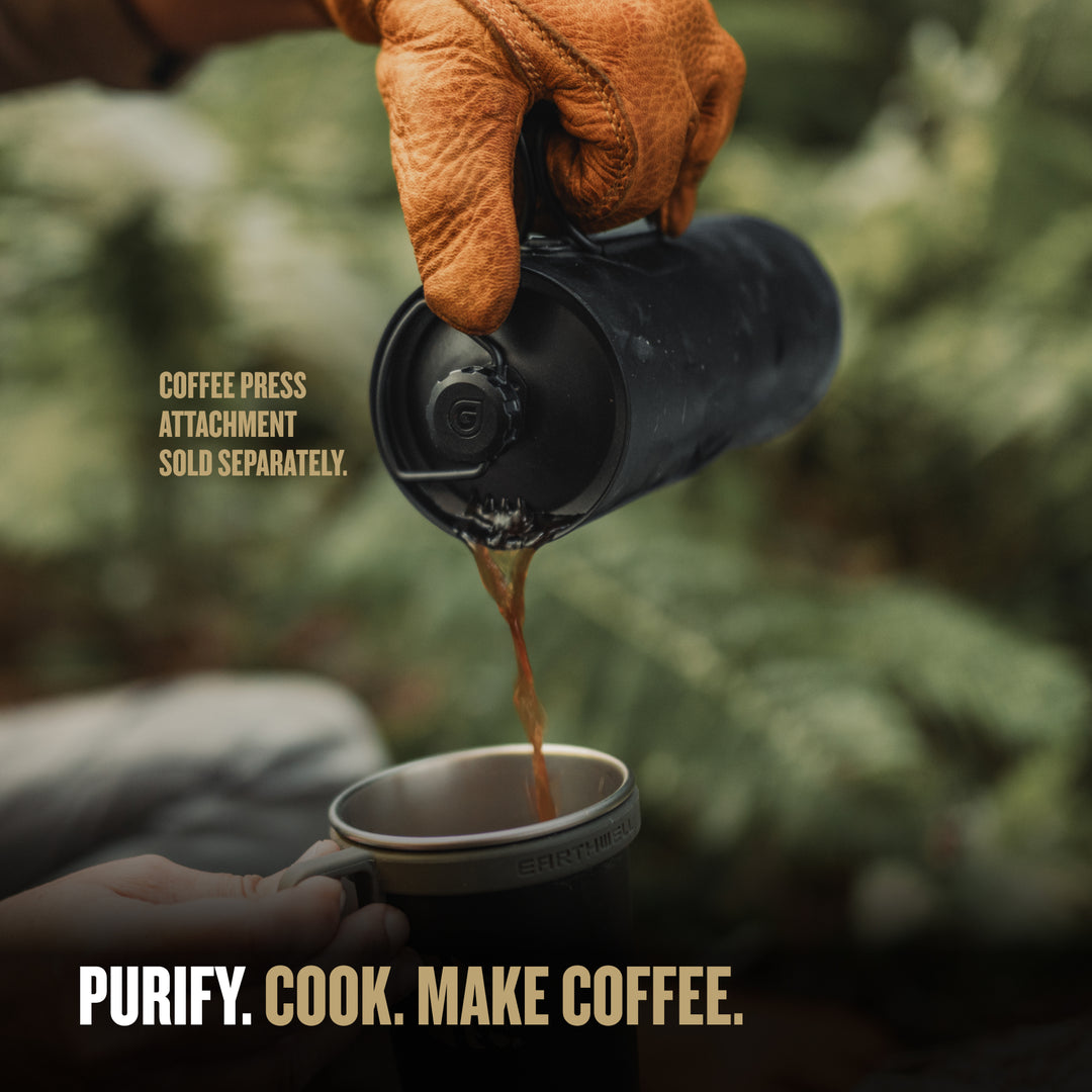 Heat it up on a fire of camp stove.