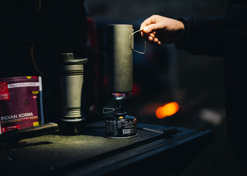 Cook with a camp meal with the Grayl Ti Stove and UltraPress Titanium.