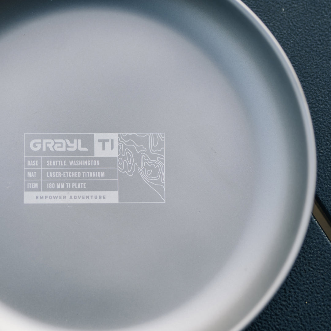 The Grayl Ti Plate with premium topography design laser-etching.